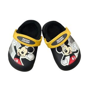 Crocs Kids' Disney Minnie Mouse Classic Clog Fuzz Lined Black Yellow Size C6